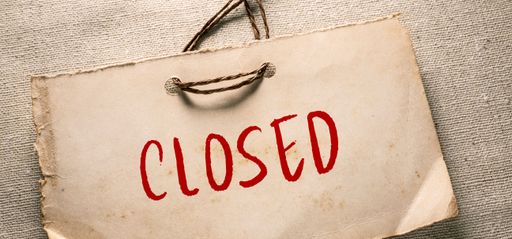 Close up conceptual shot of a business idea showing Closed
