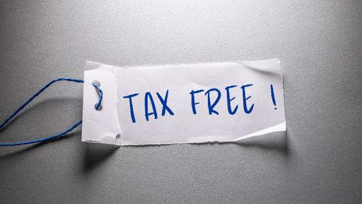 Close up conceptual shot of a business idea showing Tax