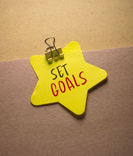 Close up conceptual shot of a business idea showing Goal