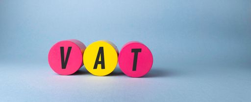 Close up conceptual shot of a business idea showing VAT