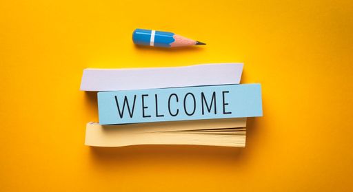 Close up conceptual shot of a business idea showing Welcome