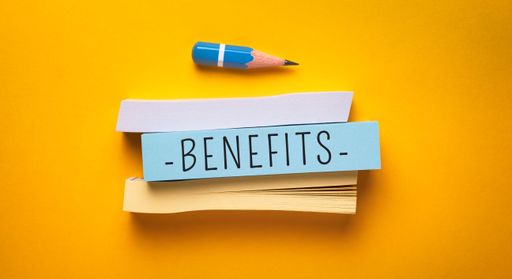 Close up conceptual shot of a business idea showing Benefits