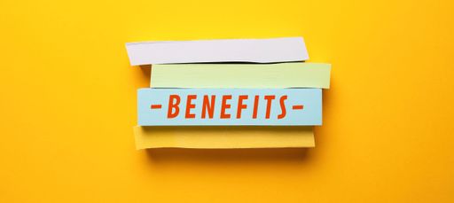 Close up conceptual shot of a business idea showing Benefits