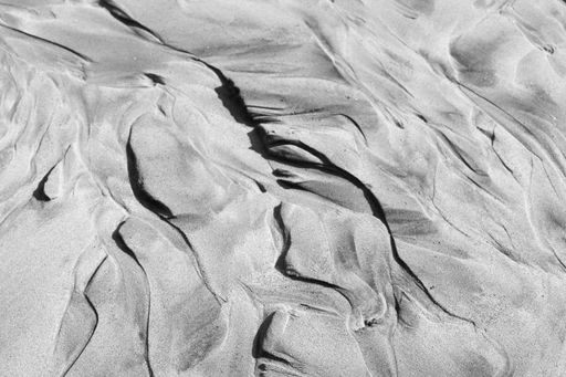 A perfect abstract pattern of sea sand formed after the tide