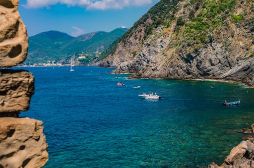A beautiful scenery of huge rock formations near the sea under the cloudy sky