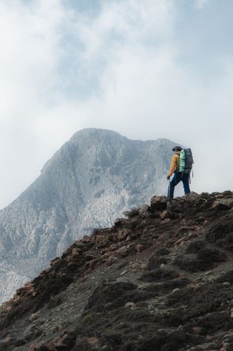 A vertical shot of a mountain hiker