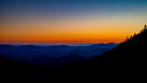 A beautiful dusk view over mountain silhouettes, can be used for wallpaper