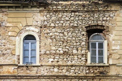 A closeup shot of an antique building exterior