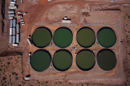 An aerial view of the tank of water and sand in bags, for hydraulic fracturing of unconventional oil in Vaca Muerta, Argentina