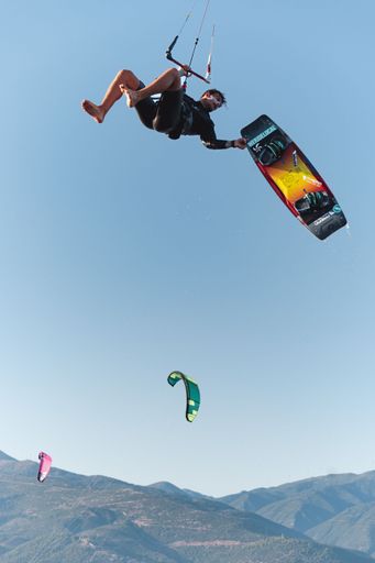 A vertical shot of people at the 1st Open Greek Kite Surfing Championships