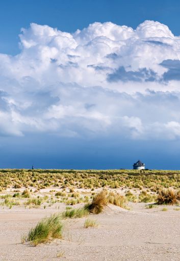 Impressive cloud formation of thunderstorm above the dunes Kijkduin Beach of The Hague