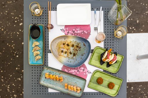 A top view of different types of traditional Asian dishes served at a local Asian restaurant