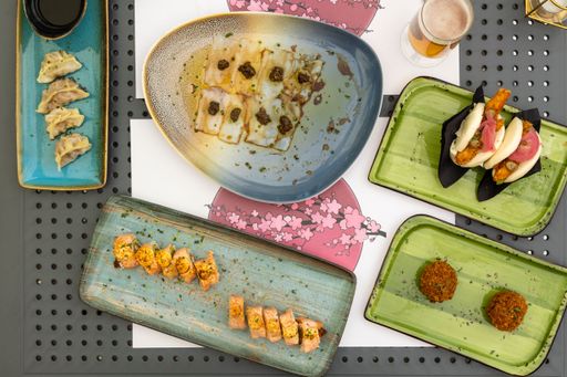 A top view of food served on a dining table