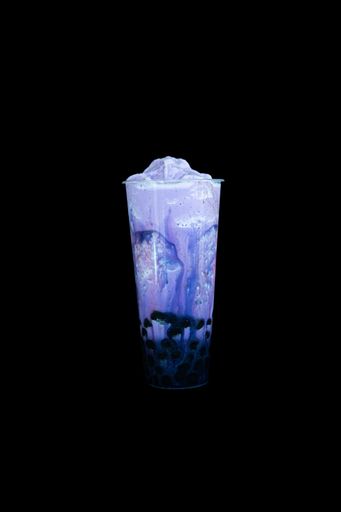 The boba smoothie tea isolated on a black background.