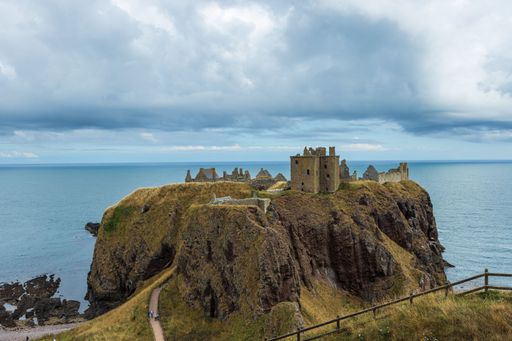 The famous Dunnottar Castle and rocky landscape in Scotland