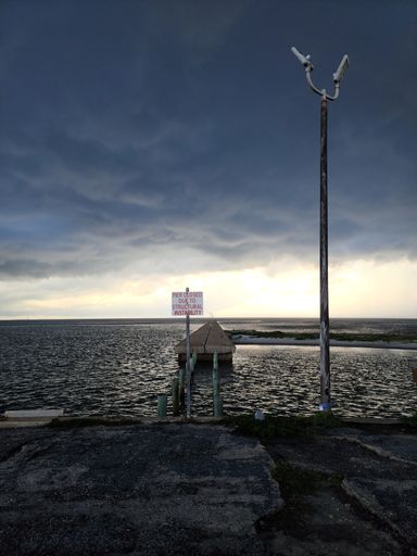 A vertical shot of an early morning storm on the Gulf of Corpus Christie