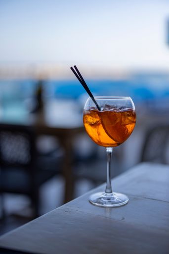 A vertical shot of a refreshing Aperol Spritz cocktail