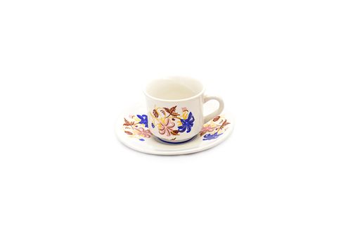 Beautiful floral pattern teacup with plate isolated on white background