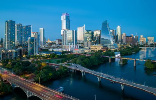 an aerial view of Austin city with river and skyscrapers in Texas