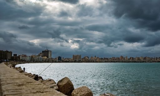 A beautiful shot of the city of Alexandria under stormy cloudy sky