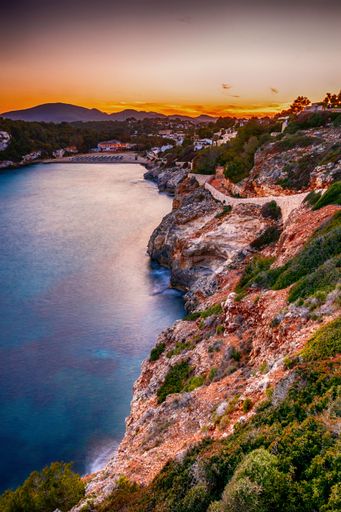A scenic view of the Mallorca shoreline with crystal blue water, Spain.