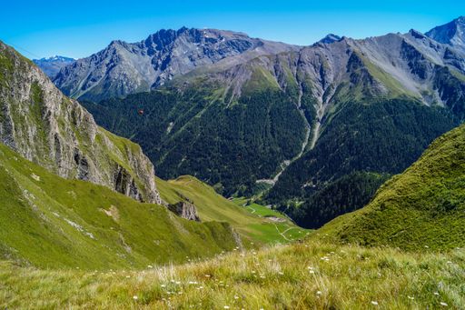 A scenic alpine landscape featuring majestic mountains. Silvretta High Alpine Road, Switzerland.