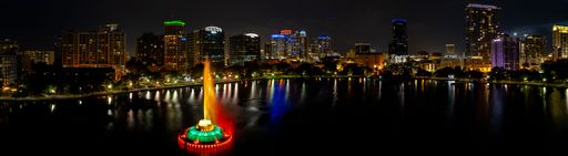 The lake Eola and Orlando city skyline at night