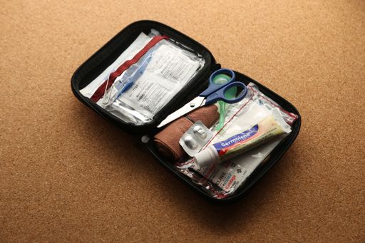 A first aid kit with basic emergency medical supplies.