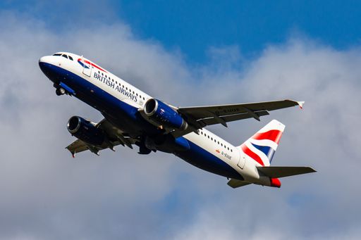 A closeup shot of a British airways airplane against a sky background