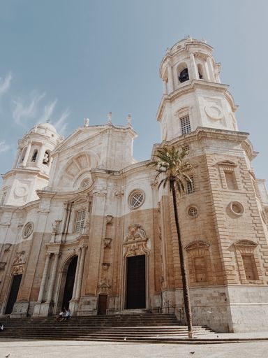 A vertical low angle shot of the Cadiz Cathedral in Cadiz, Spain