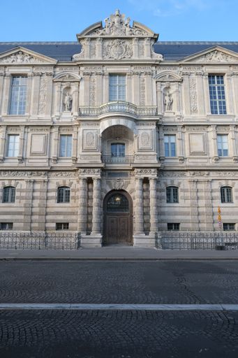 A vertical shot of the famous Louvre museum in Paris, France