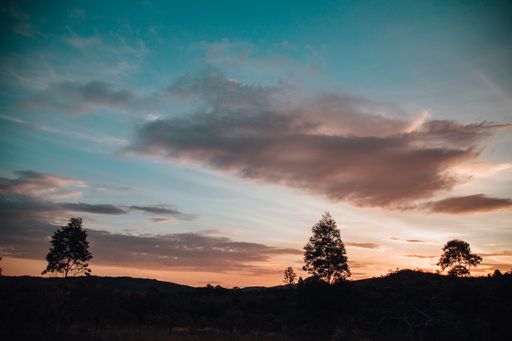 A mesmerizing view of a mountainous landscape at scenic sunset