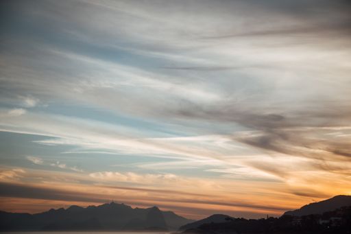 A mesmerizing view of a mountainous landscape at scenic sunset