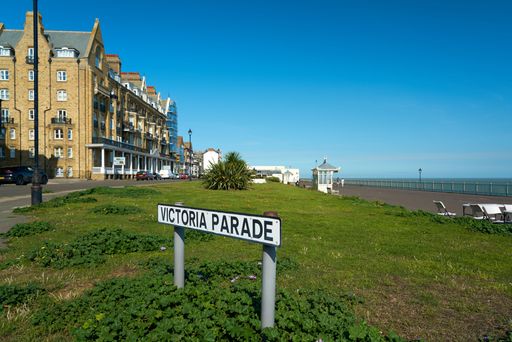 The Victoria Parade sign with the old Granville hotel in the background