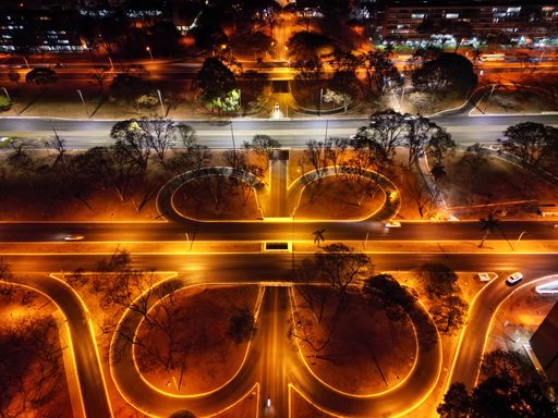 An aerial of a highway intersection in the city of Brasilia during nighttime