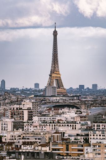 An aerial view of Eiffel tower surrounded by buildings in Paris