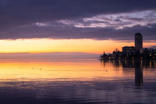 Winter cloudy sunset over the Geneva Lake in Montreux, Switzerland