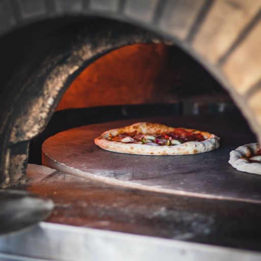 An Italian pizza baking in a wood-fired oven