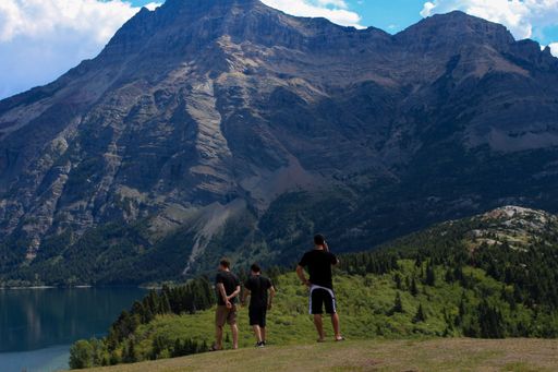 A group of men on a hill in Waterton National Park, Alberta