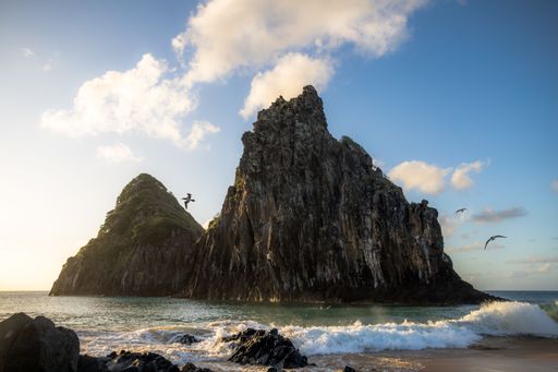 The beautiful view of Two Brothers Rock. Cacimba do Padre, Fernando de Noronha, Pernambuco, Brazil.