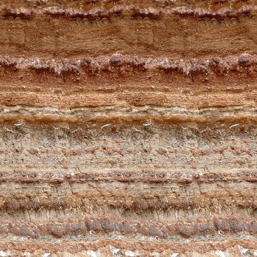 The brown and beige striped soil surface - beautiful nature background