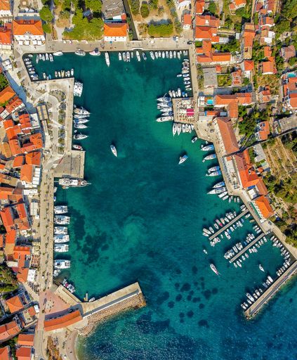 Beautiful aerial view of idyllic town Jelsa on coast of Hvar island in Croatia