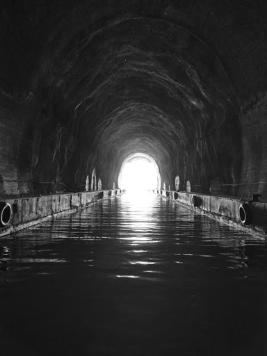 A vertical shot of underground drainage sewer tunnel