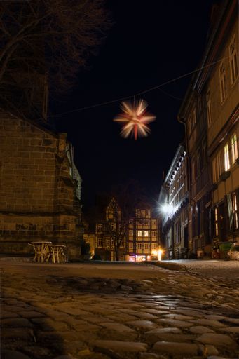A vertical shot of the Downtown Quedlinburg at night, Germany