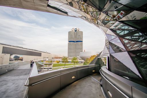 View of the BMW Museum in Munich Germany from BMW Welt. This was taken during Oktoberfest in the fall.