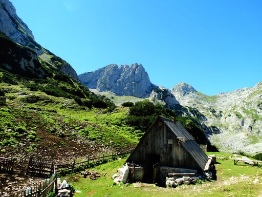 A beautiful view of a wooden house in a mountainous landscape