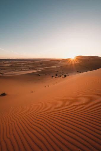 A vertical shot of the breathtaking desert under the blue sky captured in Morocco