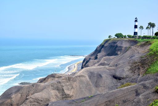 View of the lighthouse in a public park in a district in the south of Lima, Peru