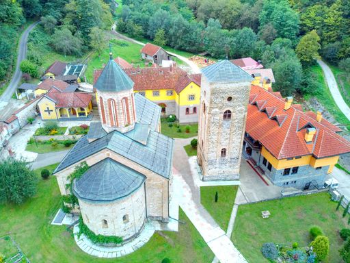 Monastery Raca in basin near Bajina Basta, Serbia surrounded by forrest trees greenery