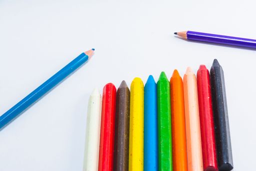A closeup of colorful wooden pencils isolated on white background